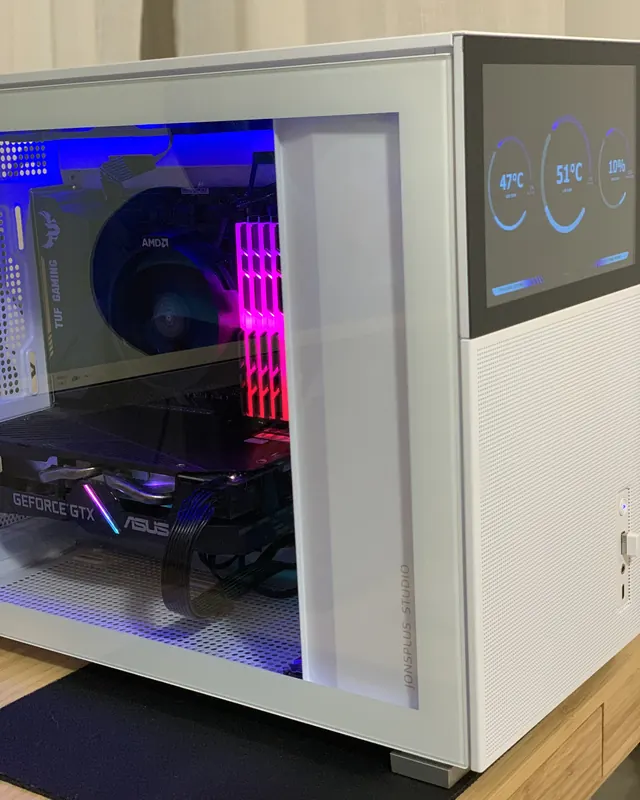PC built in a white Jonsplus case, with an ASUS GeForce GTX graphics card and RGB memory